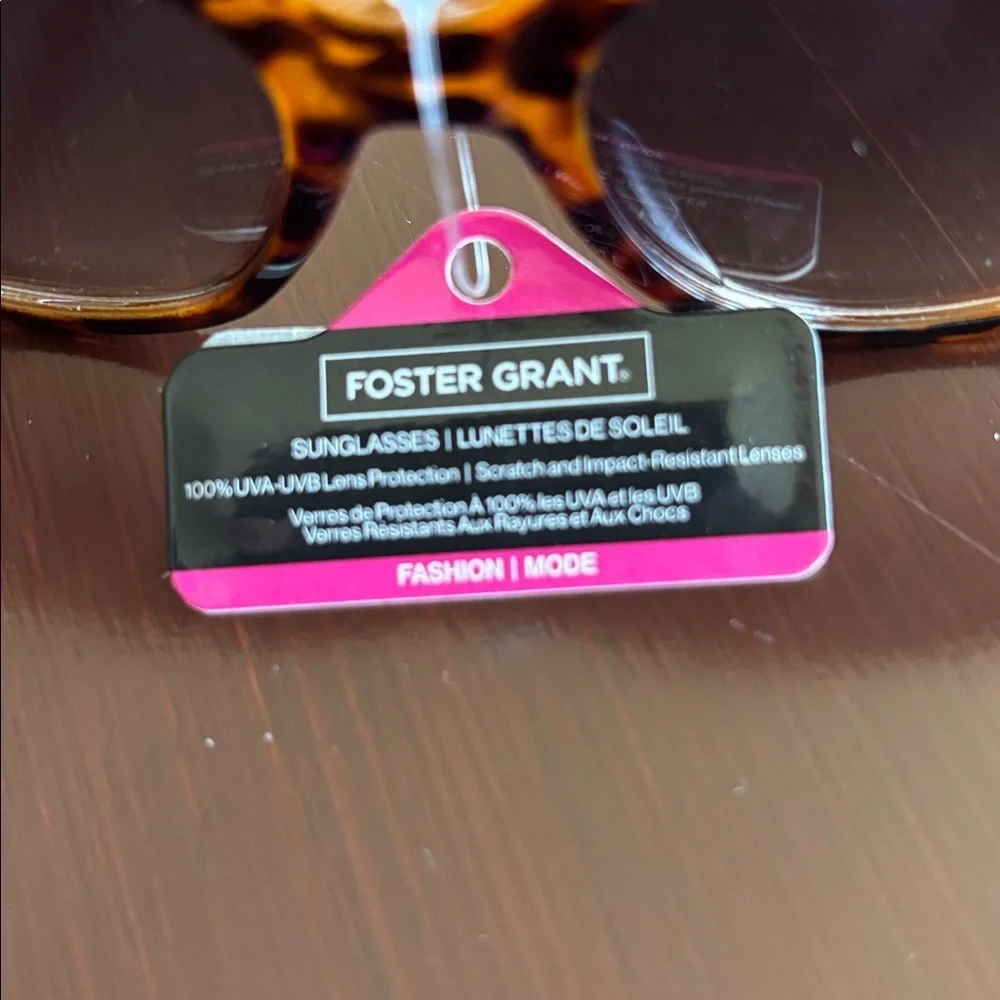 Foster Grant 100% UVA-UVB protection leopard print, gold tone beaded frame edge
